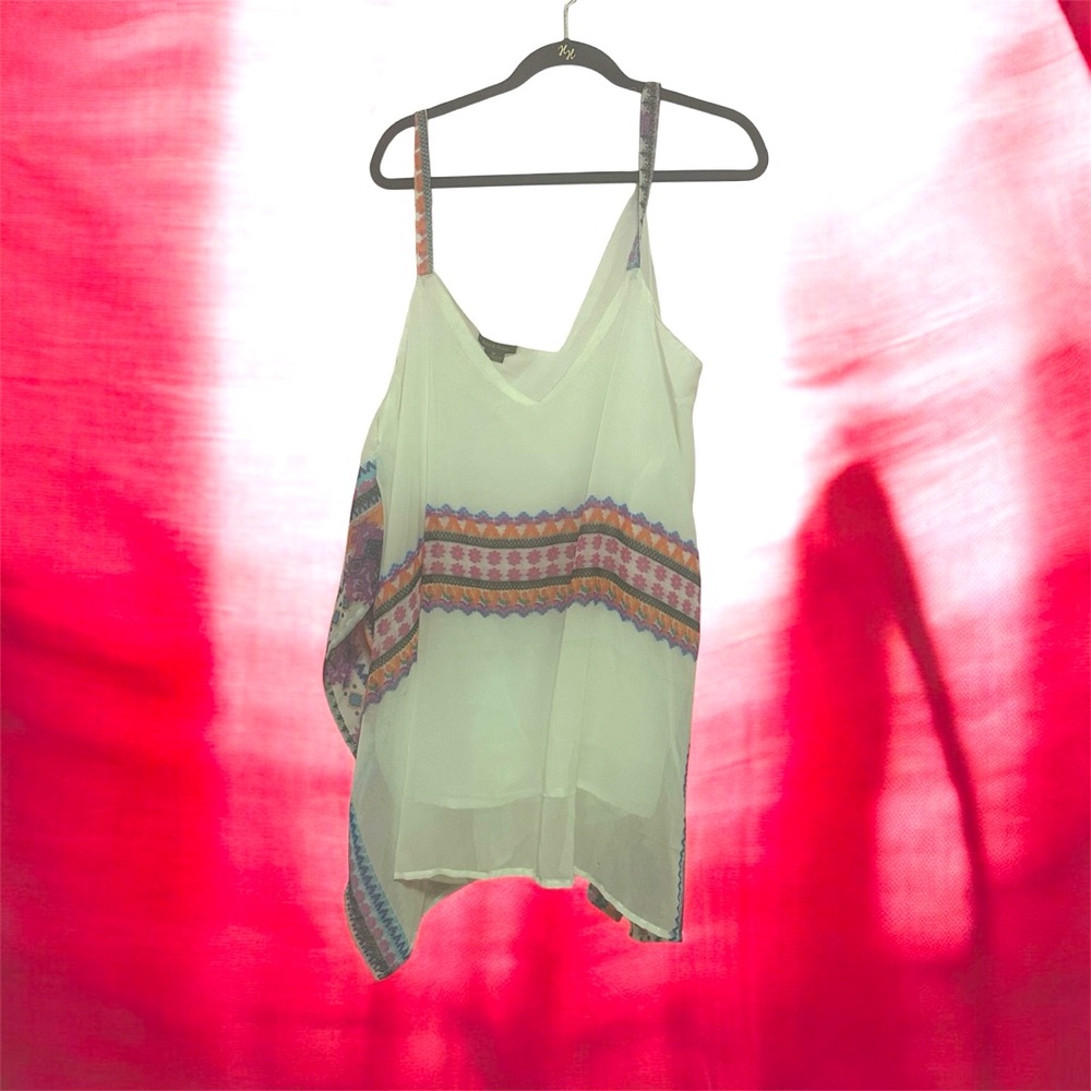 Cream sleeveless tunic with floral designs